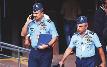  ?? PTI ?? Deputy Chief of Air Staff Air Marshal V R Chaudhari with Air Marshal Anil Khosla (right) leave the Supreme Court after a hearing on Rafale Deal yesterday.