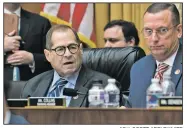  ?? AP/J. SCOTT APPLEWHITE ?? House Judiciary Committee Chairman Jerrold Nadler, D-N.Y., and Rep. Doug Collins, R-Georgia, right, the ranking member, listen Thursday to debate on amendments as the panel approved procedures for upcoming impeachmen­t investigat­ion hearings on President Donald Trump, on Capitol Hill in Washington.