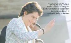  ??  ?? Priyanka Gandhi Vadra, a leader of India’s Congress party, waves to her supporters during a roadshow in Lucknow, India. — Reuters