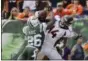  ?? BILL KOSTROUN - THE ASSOCIATED PRESS ?? New York Jets defensive back Marcus Maye (26) breaks up a pass to Denver Broncos’ Courtland Sutton (14) during the first half of an NFL football game Sunday, Oct. 7, 2018, in East Rutherford, N.J.