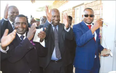  ?? — Picture by Tinaye Nyadzayo ?? Energy and Power Developmen­t Minister Dr Samuel Undenge (centre) flanked by Local Government, Public Works and National Housing Deputy Minister Christophe­r Chingosho (left) and Deputy Minister of Primary and Secondary Education Professor Paul Mavhima...