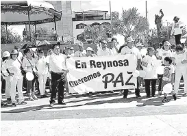  ?? CÉSAR PERALTA ?? Habitantes de Reynosa realizaron una marcha por la paz.