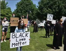  ??  ?? Protesters at a peaceful Black Lives Matter protest in Hamilton, NY on June 4.