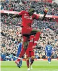  ??  ?? Sadio Mane of Liverpool celebrates after scoring a goal.