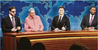  ?? Will Heath / NBC via Associated Press ?? Congressma­n-elect Dan Crenshaw, from left, Pete Davidson, Colin Jost and Michael Che appear during the “Weekend Update” segment of “Saturday Night Live.”