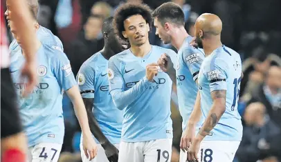  ?? Picture: AFP ?? GOALS GALORE. Manchester City’s Leroy Sane (C) celebrates with teammates after scoring their sixth goal during the English Premier League match against Southampto­n last night.