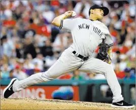  ?? Matt Slocum˜the Associated Press ?? Yankees rookie Jonathan Loaisiga shut out the Phillies on one hit and two walks and struck out eight over 5 1/3 innings in New York’s 4-2 win Monday at Citizens Bank Park.