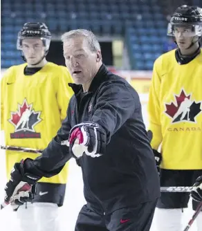  ?? JEFF BASSETT/THE CANADIAN PRESS ?? National team head coach Tim Hunter wants his charges playing fast and playing the “Canadian way” during the World Junior Summer Showcase in Kamloops, B.C.