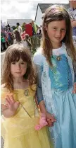  ??  ?? Finery Lucia Honeyman (4), and Sophie Trotter (7), put on their glad rags to take part in the gala