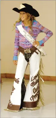  ?? MARK HUMPHREY ENTERPRISE-LEADER ?? Sammie Jo Moore, 12, of Rose, Okla., is competing for the junior queen crown. Lincoln Riding Club 2013 princess Landree Cunningham models cowgirl attire during the 2014 pageant. Landree, now 11, is competing for the junior queen crown this year.