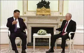  ?? ?? Xi Jinping meets Russian President Vladimir Putin, in Moscow on Monday. ANI.