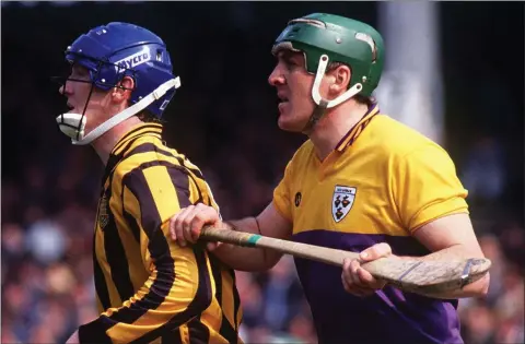  ??  ?? Wexford full-back Eamon Cleary, seen here keeping tabs on Kilkenny’s Christy Heffernan, endured some crushing defeats in Tom’s company.