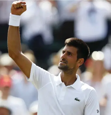  ?? ?? NO FIVE-SETTERS, PLEASE: Novak Djokovic in upbeat mood after a clinical victory in his second-round match at Wimbledon yesterday.