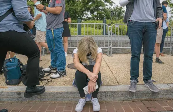  ?? NATHAN HOWARD/GETTY ?? An abortion-rights activist reacts to the 6-3 ruling in Dobbs v. Jackson Women’s Health Organizati­on, which overturns Roe v. Wade, on June 24 in Washington, D.C.