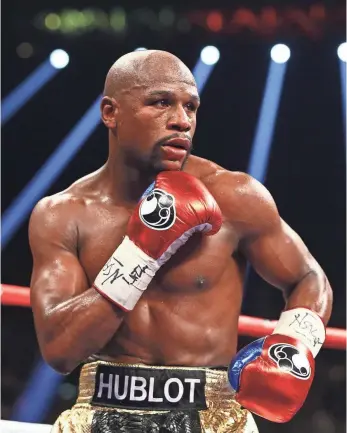  ?? MARK J. REBILAS, USA TODAY SPORTS ?? Floyd Mayweather Jr. is under fire after a report said he broke protocol for IV treatments.