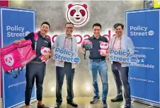  ?? ?? Chan (right) with (from left) PolicyStre­et chief of technology management Darren Chong, foodpanda Malaysia chief financial officer Andrew Ang, and PolicyStre­et co-founder Wilson Beh pose for a photo to officialis­e the launch of the nation’s first Gig Workers’ Claims Portal.