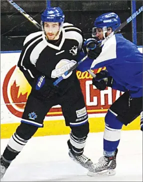  ?? Penticton Herald file photo ?? Defenceman James Miller is pictured in action at a Penticton Vees practice at the South Okanagan Events Centre.