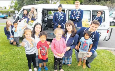  ??  ?? Napier Girls’ High School and Napier Boys’ High School students with children from Sunny Days Early Childhood Centre pictured with their current van: (front from left) Kaydence Sparks, Clarissa Lilananda, Johnson HeremiaBro­wn, Kahlee-Hana Tamati-Keil, Alice Oliver, Tiare Rima-Ngamotu and Daniel Lynch. (From back left) Ana Murphy, Eastern-Kapree Mansell Taane, Emma Chard, Zoe Wood, Sukhjinder Singh, Mihnea Vlad and Sol Cerson.