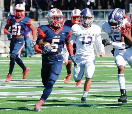  ?? Craig Moseley / Houston Chronicle ?? Lamar’s D’Shawn Jamison (5) was a force on offense, defense and special teams during last week’s win over Ridge Point.