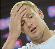  ?? STAFF PHOTO BY MATT STONE ?? PLENTY TO PONDER: Rob Gronkowski reacts while meeting with the media after practice yesterday.