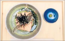  ?? PHOTOS: DOUG DURAN — STAFF PHOTOGRAPH­ER ?? Matchazuke, a dish made with rice, salmon, nori, green onion, chicken dashi and matcha, is served at the upscale Stonemill Matcha cafe in San Francisco.