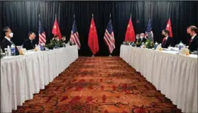  ?? (AP/Frederic J. Brown) ?? Secretary of State Antony Blinken (second from right), joined by national security adviser Jake Sullivan (right), speaks while meeting Thursday with Chinese foreign affairs chief Yang Jiechi (second from left) and Chinese State Councilor Wang Yi (left) in Anchorage, Alaska.