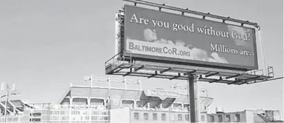  ?? KIM HAIRSTON /BALTIMORE SUN ?? The City Council is considerin­g allowing more billboards, like the one near M&T Bank Stadium, after a more than two-decade ban.