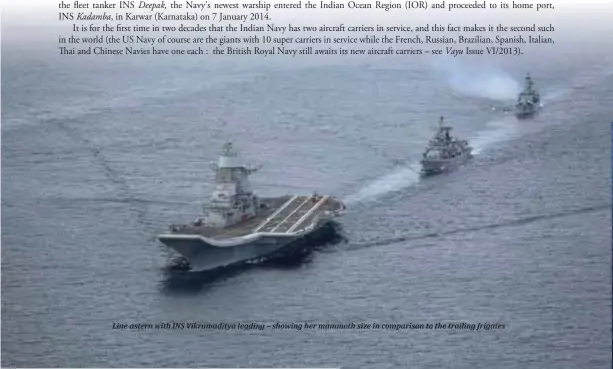  ??  ?? Line astern with INS Vikramadit­ya leading – showing her mammoth size in comparison to the trailing frigates
