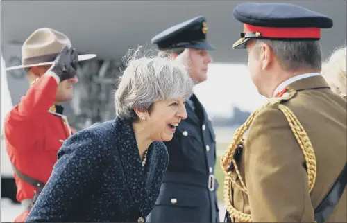  ?? PICTURES: PA WIRE. ?? OVERSEAS MISSION: Prime Minister Theresa May arrives in Ottawa, Canada, to hold post-Brexit trade talks with Canadian Prime Minister Justin Trudeau