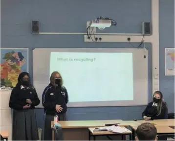  ??  ?? Members of the Dundalk Grammar School group teaching a class about recycling as part of their project.