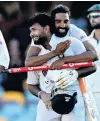  ?? PHOTO: GETTY IMAGES ?? Rishabh Pant (left) and Mohammed Siraj, of India, celebrate victory on day five of their team’s fourth test against Australia at The Gabba in Brisbane yesterday.