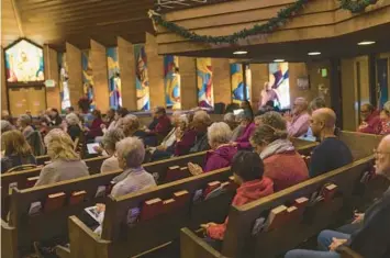  ?? JOANNA KULESZA/THE NEW YORK TIMES ?? Although a clear majority of Protestant churches will meet in some form this Christmas Day, more of them this year, such as King of Glory Lutheran Church in Arvada, Colo., are making the decision to opt out.