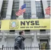 ?? — Reuters ?? A Snapchat sign hangs in front of the NYSE in New York.