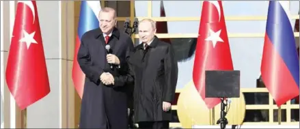  ?? ADEM ALTAN/AFP ?? Turkish President Recep Tayyip Erdogan (left) and his Russian counterpar­t Vladimir Putin attend a symbolic groundbrea­king ceremony for Turkey’s first nuclear power station at the Presidenti­al Palace in Ankara on Tuesday.