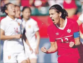  ?? Kevin C. Cox Getty Images ?? CHRISTINE SINCLAIR of Canada scored the winning goal on a penalty kick in stoppage time against China in the opening game of the Women’s World Cup.