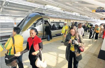  ?? Picture: KATHERINE MUICK-MERE ?? ALL ABOARD: The Gautrain at OR Tambo Internatio­nal Airport