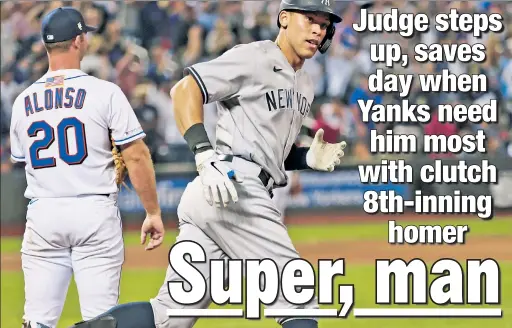 ?? N.Y. Post: Charles Wenzelberg ?? FIT TO BE TIED: Aaron Judge rounds first base after hitting a game-tying home run in the top of the eighth inning on Saturday night at Citi Field. The 8-7 win over the Mets ended a seven-game losing streak for the Yankees.