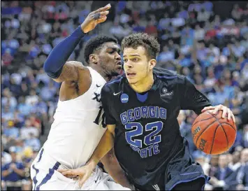  ?? KEVIN C. COX / GETTY IMAGES ?? R.J. Hunter led Georgia State to an NCAA Tournament upset of Baylor before the Panthers lost to Xavier in the next round.