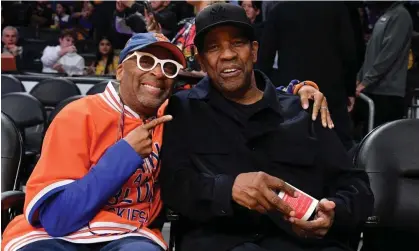  ?? Photograph: Allen Berezovsky/Getty Images ?? Spike Lee and Denzel Washington in 2023.