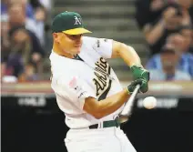  ?? Gregory Shamus / Getty Images ?? With his father, Jim, pitching, the A’s Matt Chapman didn’t make it out of the first round of the Home Run Derby.