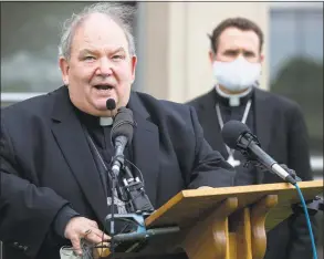  ?? Carlos Gonzalez / Associated Press ?? Archbishop Bernard Hebda speaks during a news conference at the Archdioces­an Catholic Center in St. Paul, Minn., on May 21, amid the coronaviru­s pandemic. The St. Paul Cathedral is only open for confession­s at this time.