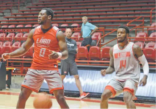  ?? WILL WEBBER/THE NEW MEXICAN ?? Zane Martin, left, and Vante Hendrix are a pair of major-college transfers on UNM’s roster this season. Martin is a point guard who started out at Towson while Hendrix is a shooting guard who began at Utah.