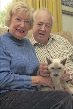  ?? Picture: Martin Apps ?? Sir Keith Speed with his wife, Lady Peggy, and their cat Simeon, at home in Rolvenden