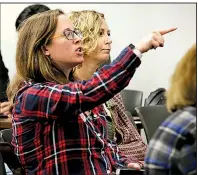  ?? Arkansas Democrat-Gazette/THOMAS METTHE ?? Veronica McClane (left) shouts “Shame!” during the state Board of Education meeting Friday as she and others protested the board’s refusal to take comments before voting to expand the Little Rock School District personnel policy panel to more than 40 members.