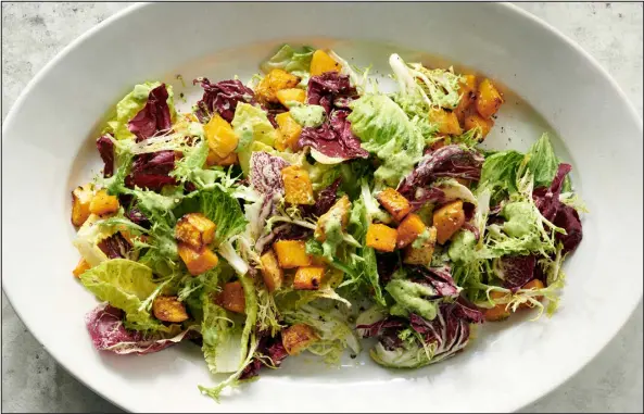  ?? PHOTOS BY DAVID MALOSH — THE NEW YORK TIMES ?? A salad with cubed roasted squash, which mellows the radicchio’s bite.