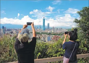  ?? David Chang EPA/Shuttersto­ck ?? THE NUMBER of mainlander­s visiting Taiwan has been declining steadily in recent years, to 978,000 in 2018.