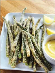  ?? TRIBUNE CONTENT AGENCY ?? Two types of breadcrumb­s help make asparagus fries crispy.