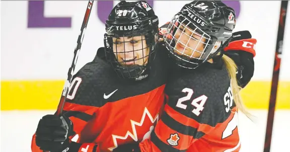  ??  ?? Sarah Nurse, left, calls the WNBA deal “a reminder that what we have considered ‘profession­al’ women’s hockey” has been anything but pro.
ANTTI AIMO-KOIVISTO/LEHTIKUVA VIA AP FILES