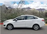  ?? Henry Payne/The Detroit News/TNS ?? ■ The 2017-2019 Ford Fiesta SE gets alloy wheels, which are good looking ‚ and affordable on a $10,000 used car.