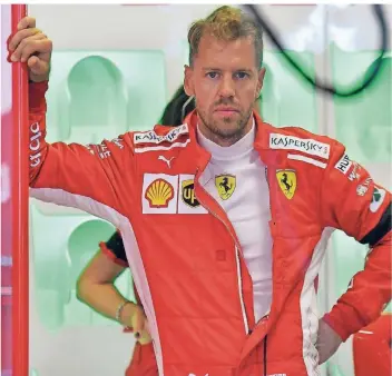  ?? FOTO: DPA ?? Zuversicht sieht anders aus. Sebastian Vettel muss den Blick bereits in die nächste Saison in der Formel 1 richten, der Titel ist mal wieder vergeben.